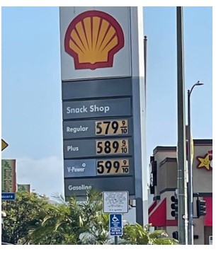 Sign with gas prices near 6 dollars in California